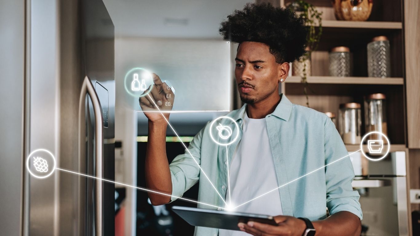 man-clicks-on-a-technology-screen